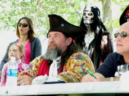 Skeleton pirate over M.A. d'Dogge's shoulder