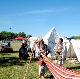 Billie and MD put away the hammock