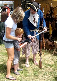 Dan affixing a bayonette to a gn