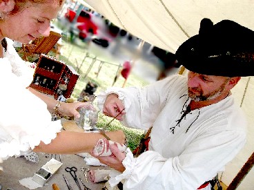 Byan applies leeches to Carla