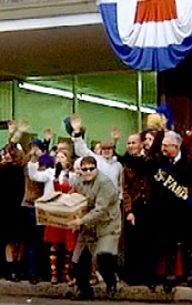 Man Throwing a Box of Marbles