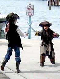 Kids Sword Fighting on the Dock