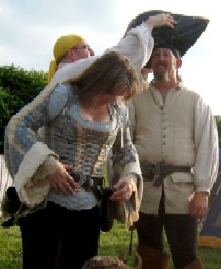 Dan Puts the Birthday Hat on Shannon