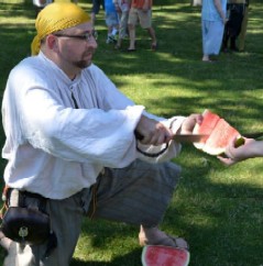 Dan Handing Out Watermelon