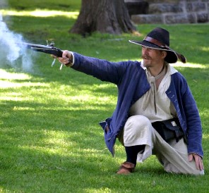 Tim Firing His Pistol