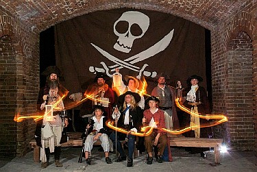 The Archangel crew waving flares about.