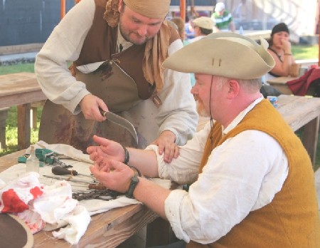 Mission amputating William's hand to remove the cuffs