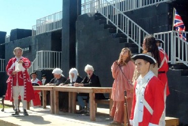 Harry Smid reading the charges against Ann and Mary