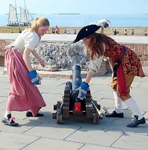 Kate loads the charge into the Cannon