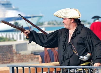 Hurricane firing his pistol at the pirates