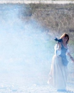 Madam Grace fires her gun at the British.