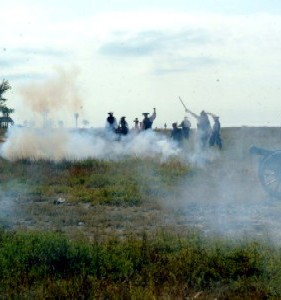 Smoke rolls out from the pirate cannons