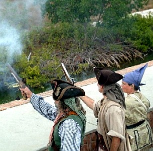 Catpain Jim, Stynky and Fayma fire their pistols.