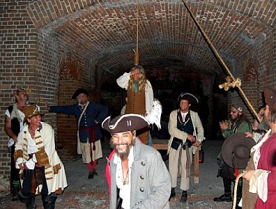 The crew laughing as Sterling is let down