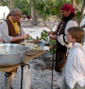 Mission & M.A. d'Dogge prepare salad with Miles giving advice