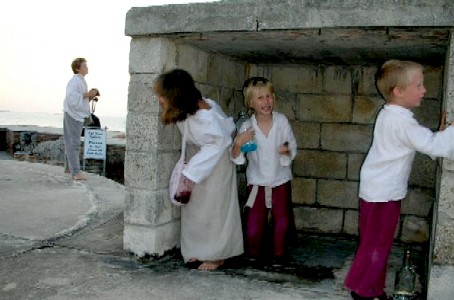 Grace, Ryan and Zach hiding from Miles
