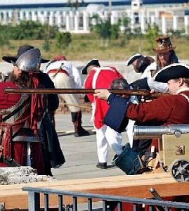 The British and militia on the fort wall