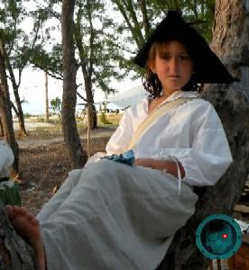 Grace Thatcher in the crook of a tree