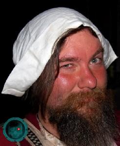 M.A. d'Dogge in a woman's hat