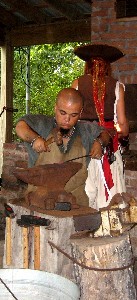 Leatherback working metal on an anvil