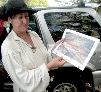 Shay showing a photo