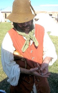 Matty, contemplating and evening of his thumbs