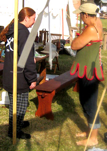 Lily and Shay work on stays