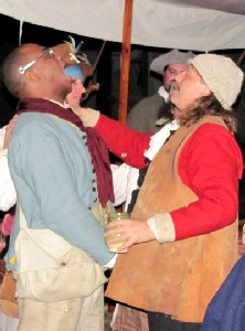 William checks Israel's teeth