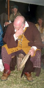 William Red Wake auctioning the plate