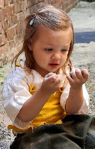 Kiera looking at her hands