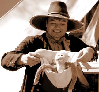 Mission holding Lob in a hat