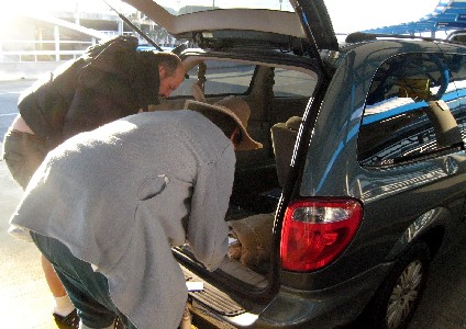 Conrad and Patrick unloading Conrad's van
