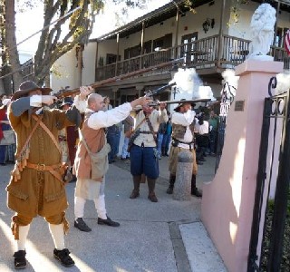 Buccaneer riflemen firing at a lion statue