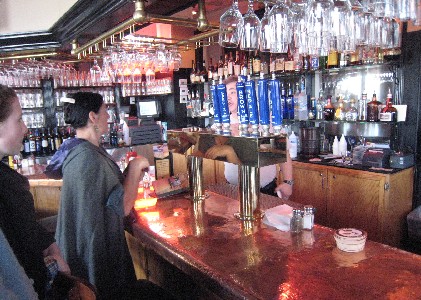 Shay asking for directions at the bar