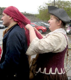 Jules Tying Mission's Scarf