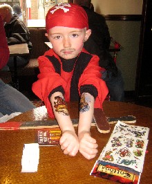 Elliot Shows Off His Tattoos